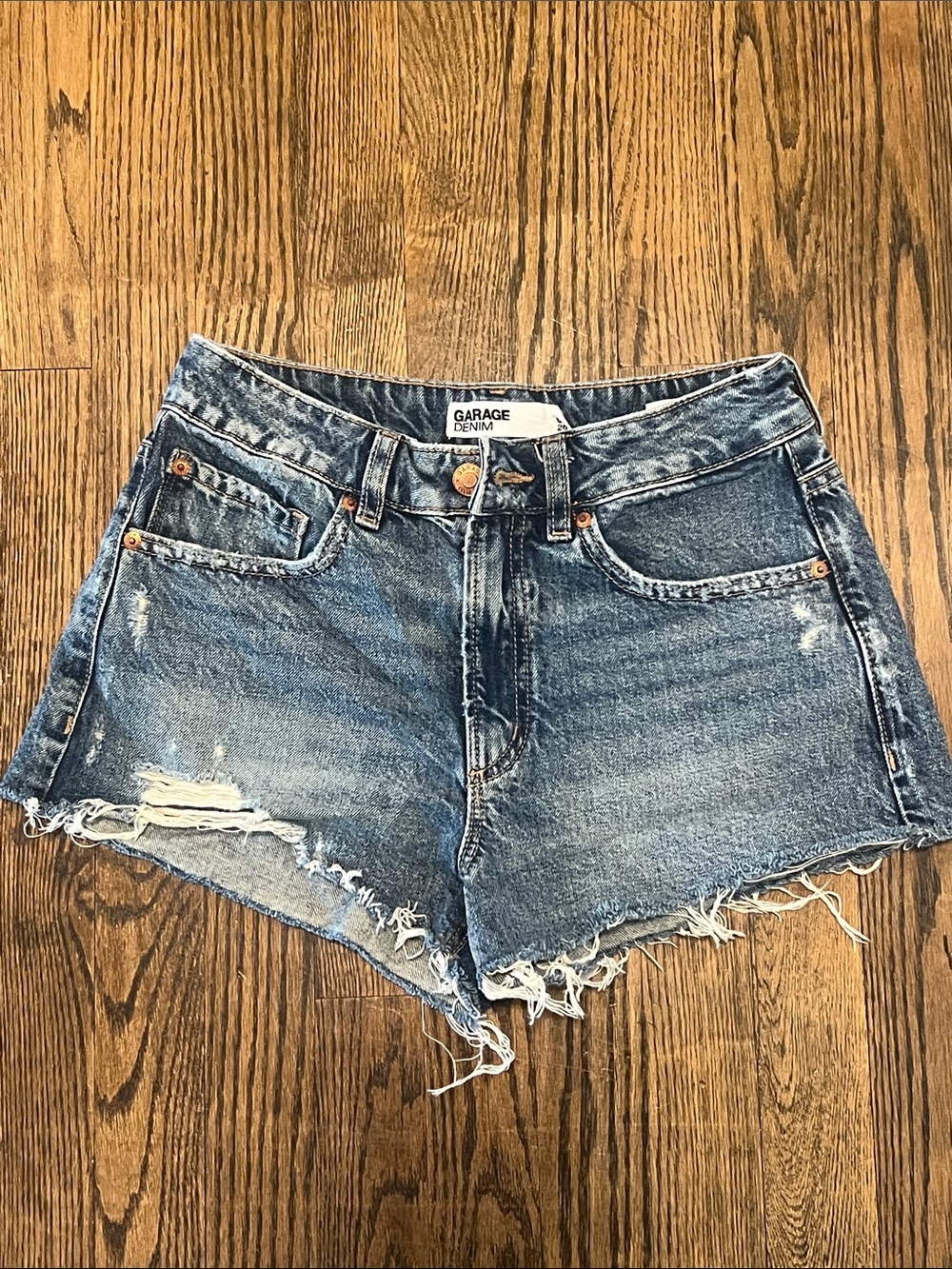 Garage Women's Light Blue Distressed Denim Shorts